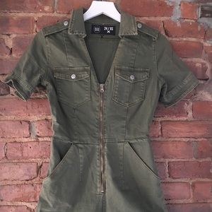 Green boiler suit style short romper.